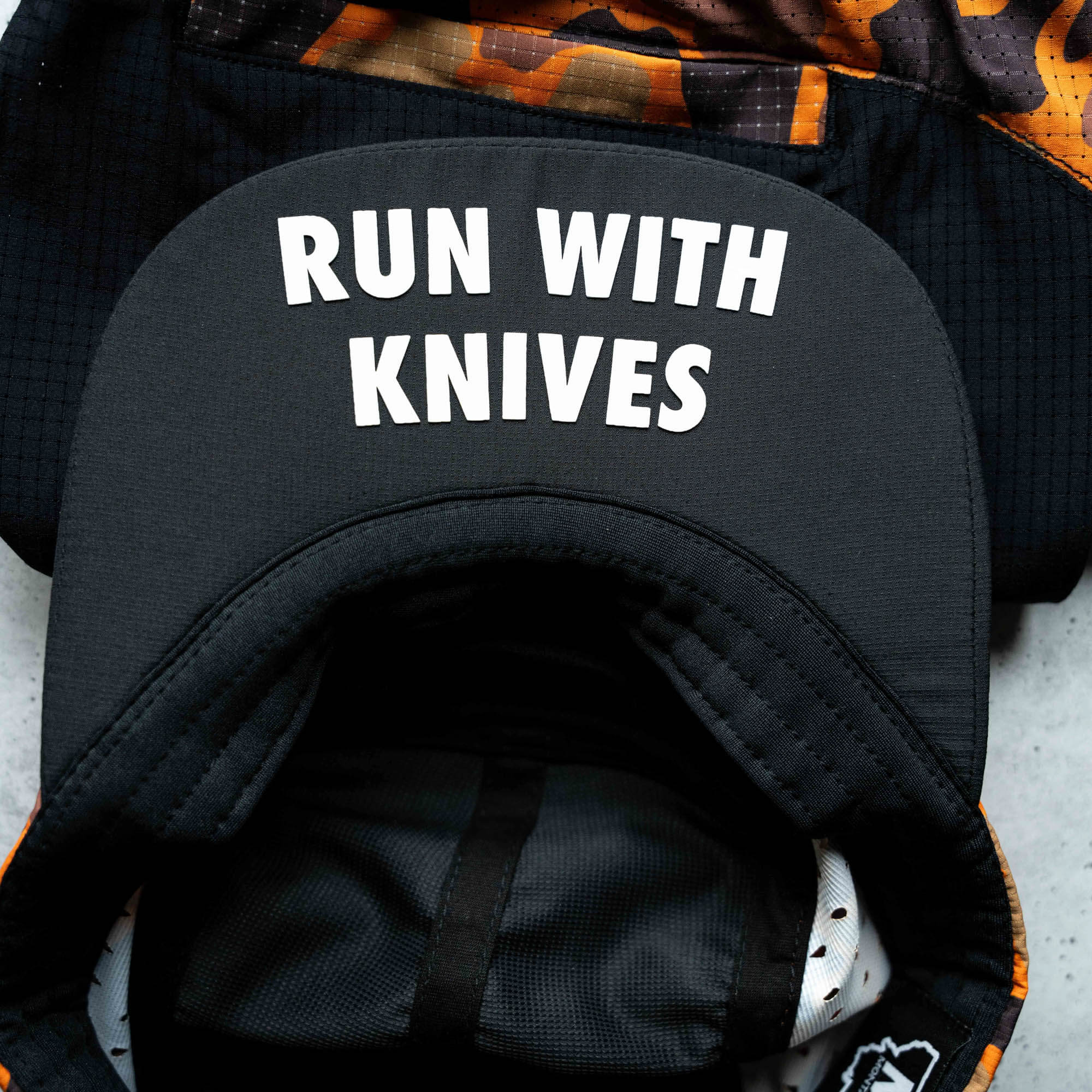MKC RUN WITH KNIVES HAT