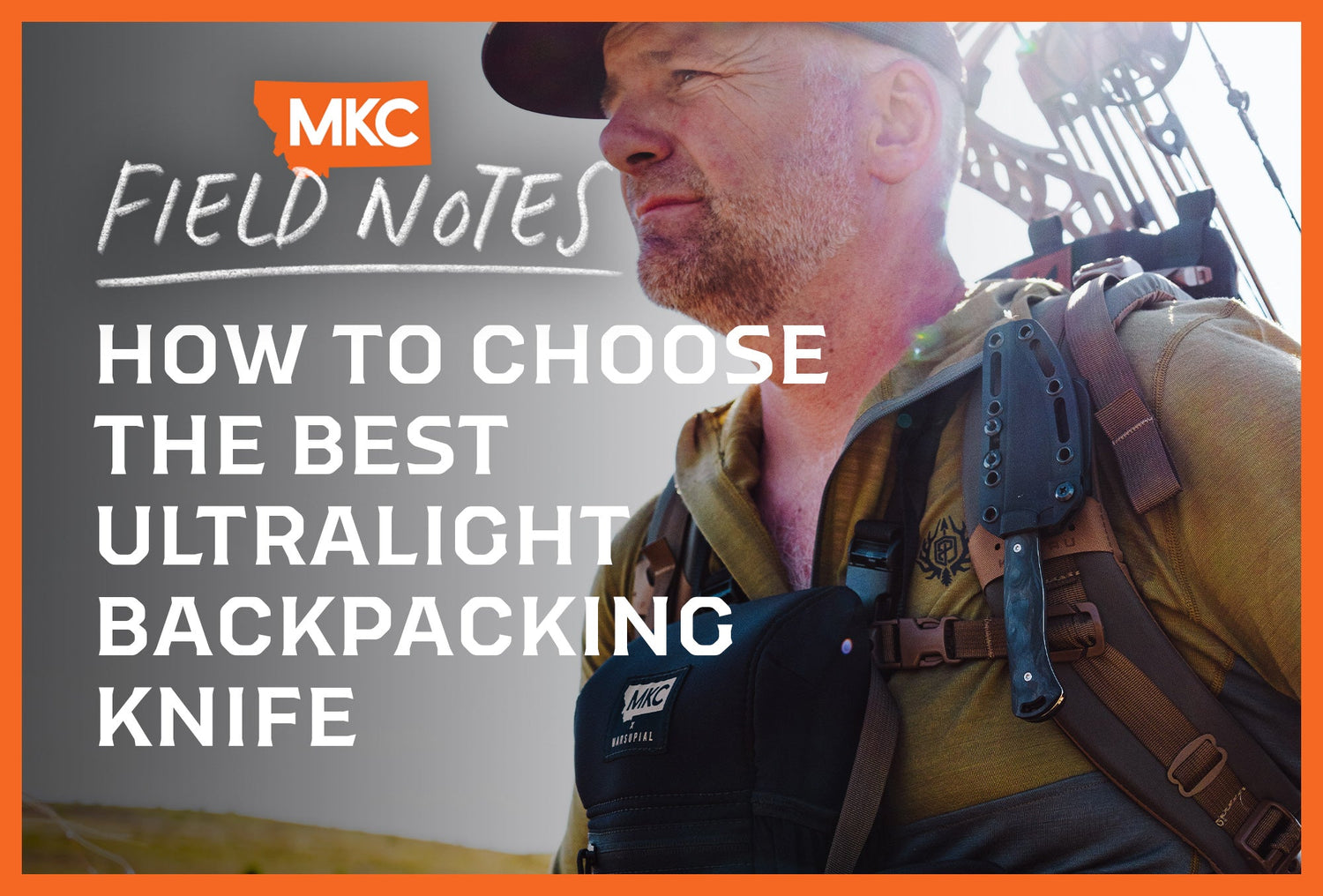 A close-up profile of a bearded hiker in a cap wearing outdoor gear with a knife sheath visible on his chest harness.