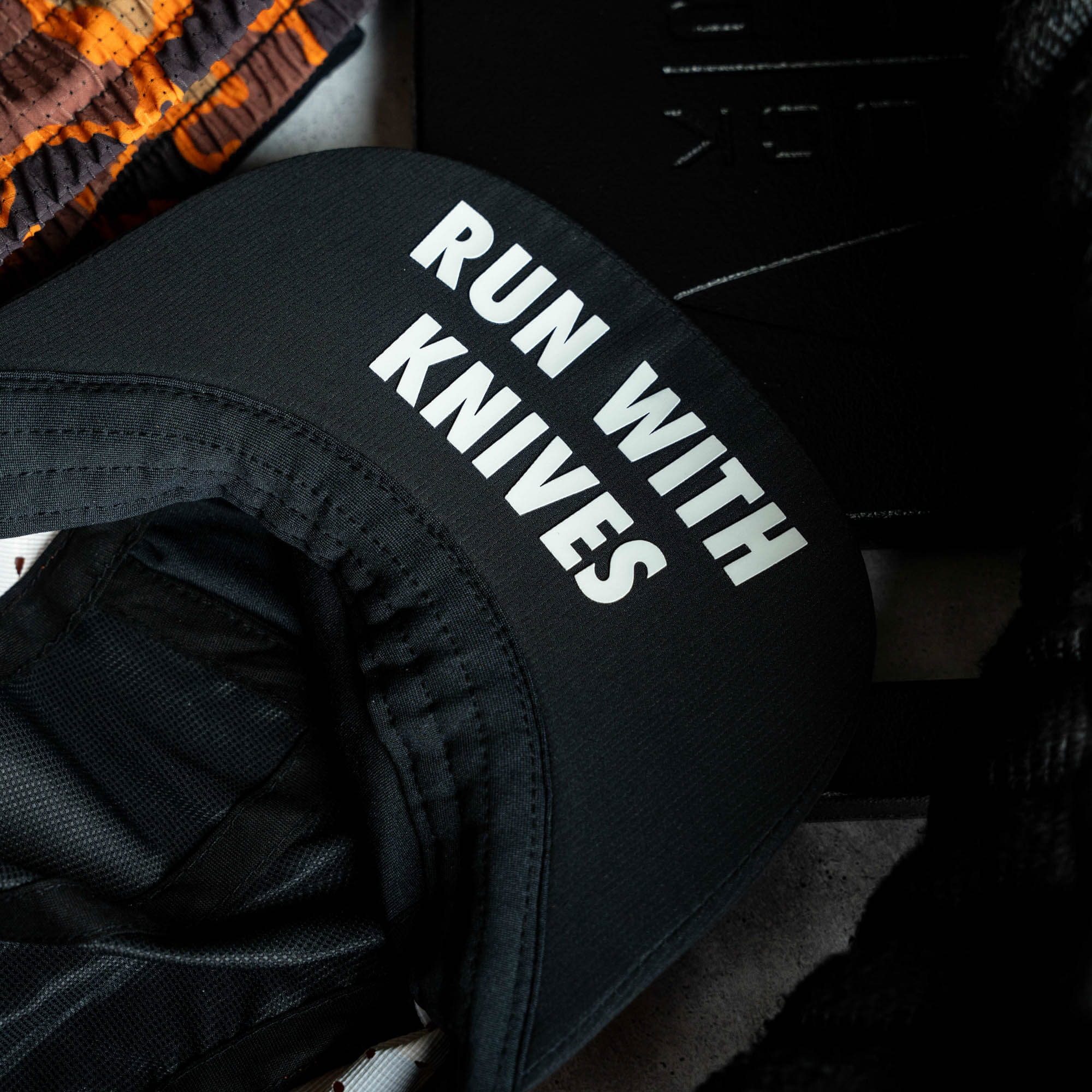 MKC RUN WITH KNIVES HAT